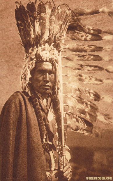 "war-bonnet and coup-stick" - Piegan, by Edward S. Curtis from The North American Indian Volume 6