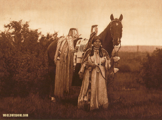 "With her proudly decked horse - Cayuse", by Edward S. Curtis from The North American Indian Volume 8

