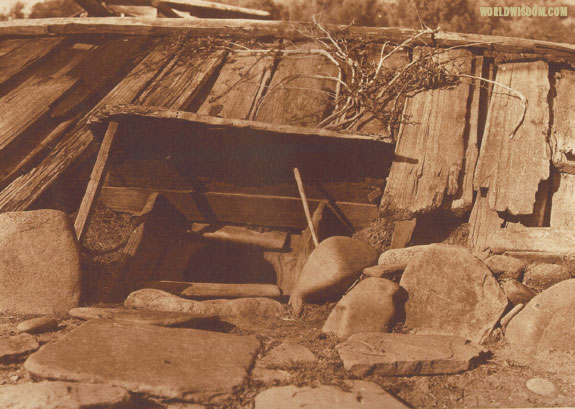 "Entrance to a Yurok sweat-house - Yurok", by Edward S. Curtis from The North American Indian Volume 13

