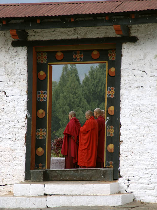 Buddhist monks in Bhutan in their maroon robes