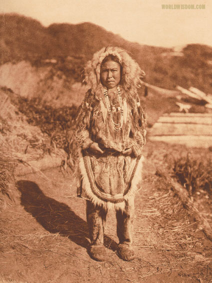 "Girl's costume" - Nanivak, by Edward S. Curtis from The North American Indian Volume 20
