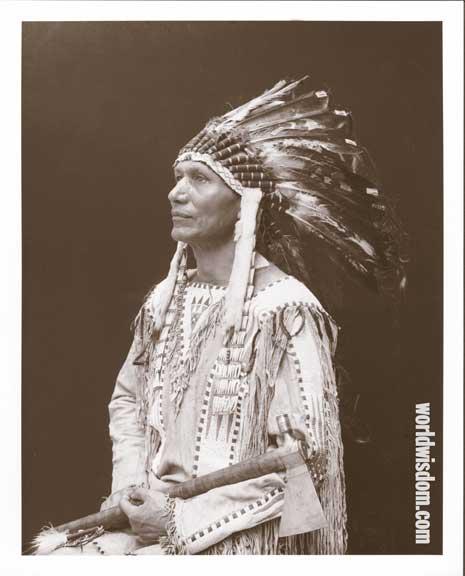 Charles Eastman (Ohiyesa of the Santee Sioux) in traditional clothing.